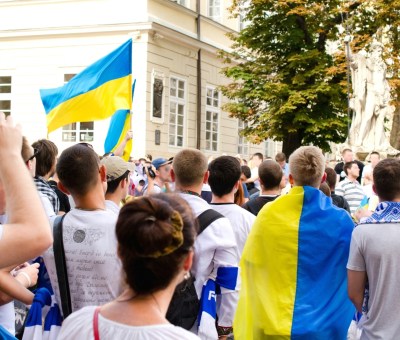 People marching in Ukraine with Flags