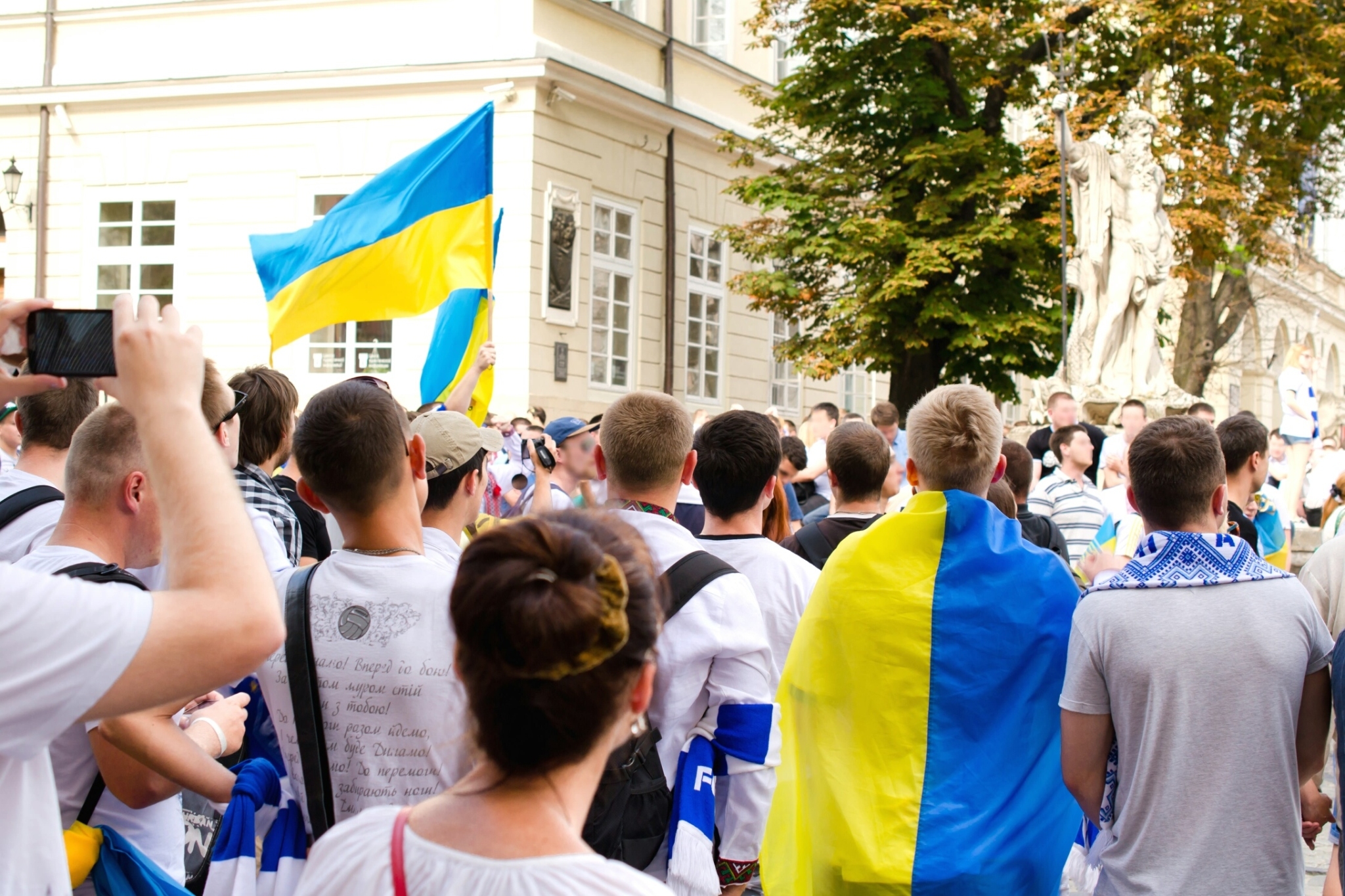 People marching in Ukraine with Flags